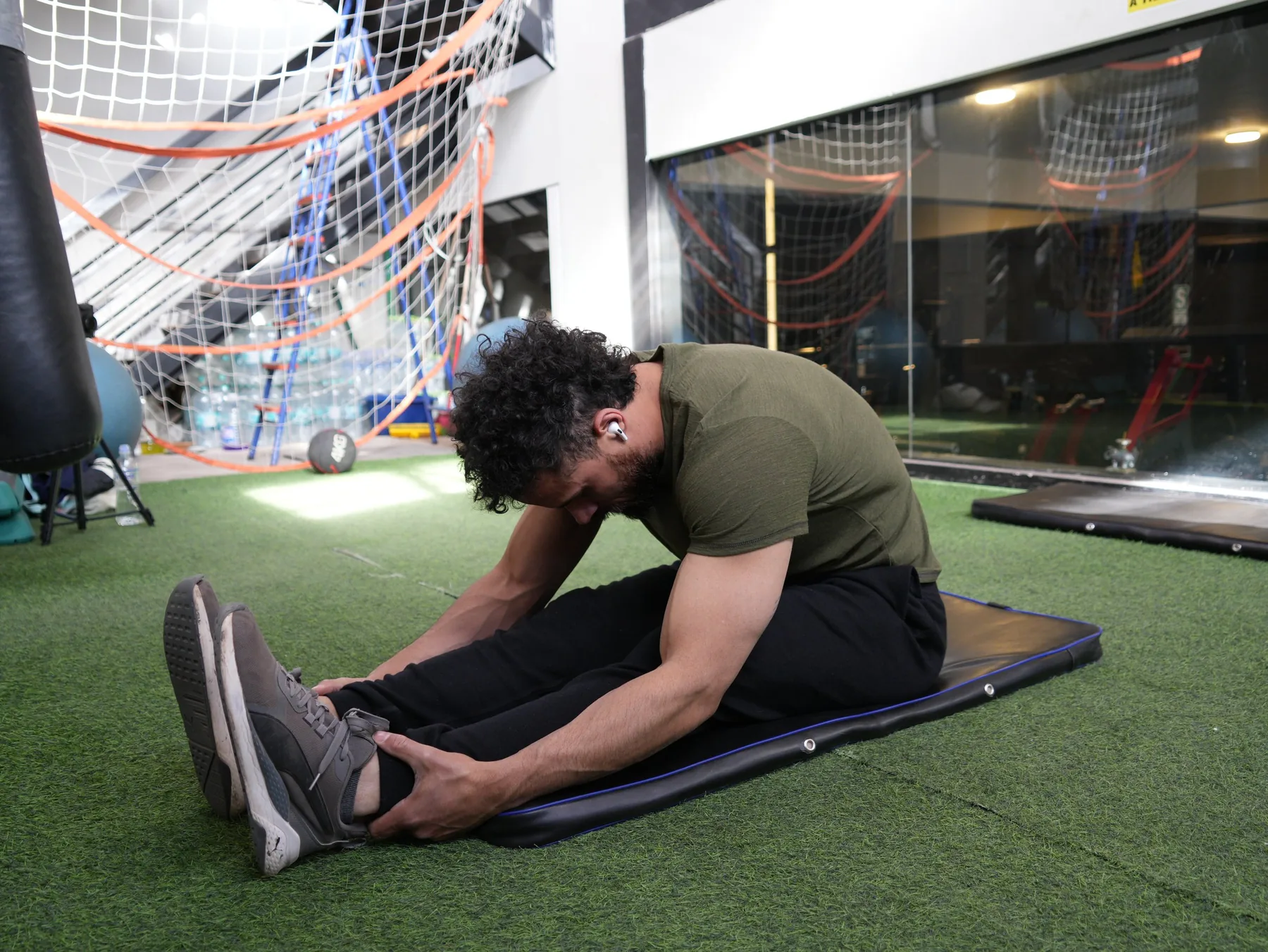 Jono Mitchell training in a bright modern gym