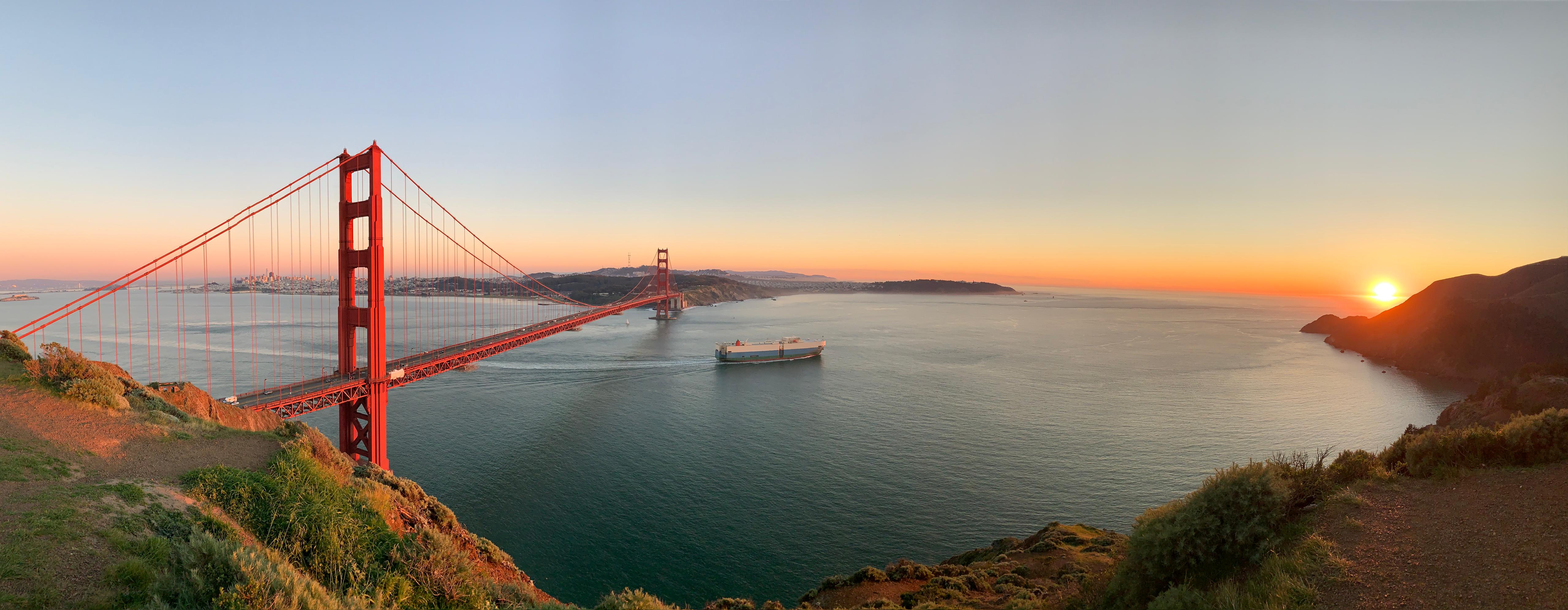 Golden Gate Bridge at sunset from the California coast