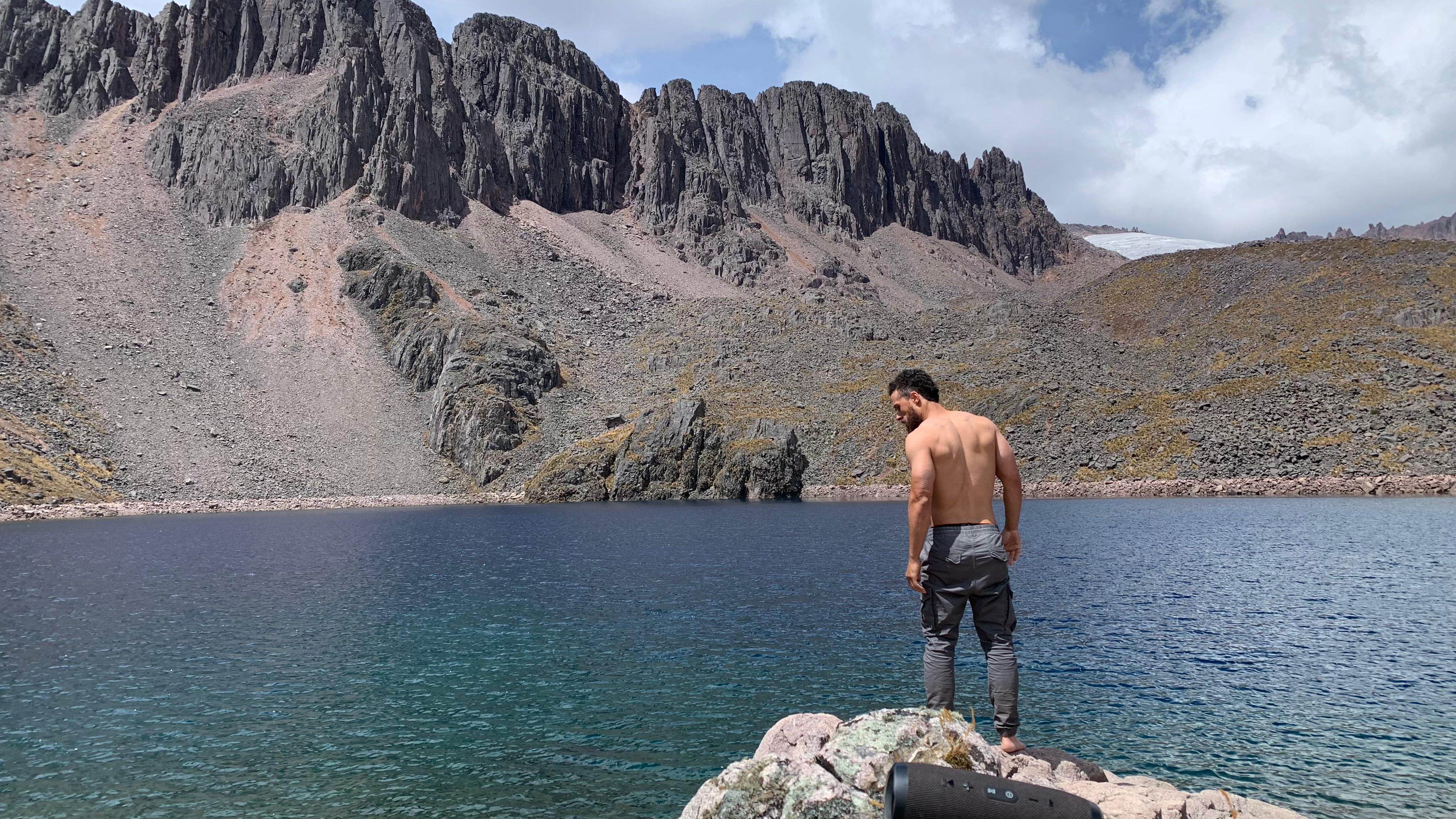Jono Mitchell at a high mountain lake near Cusco